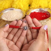 Silver lord ganeshji Rudraksha Rakhi for Brother